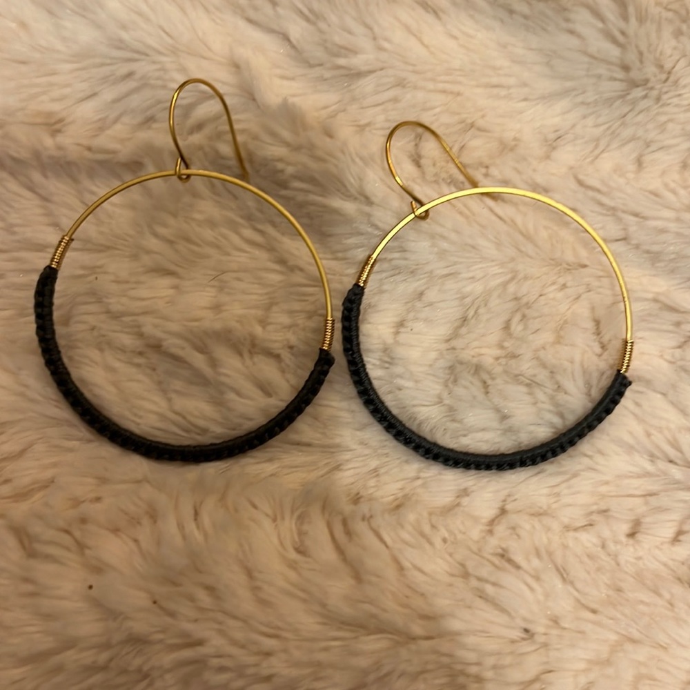 Magnolia gold and blue braided hoops.